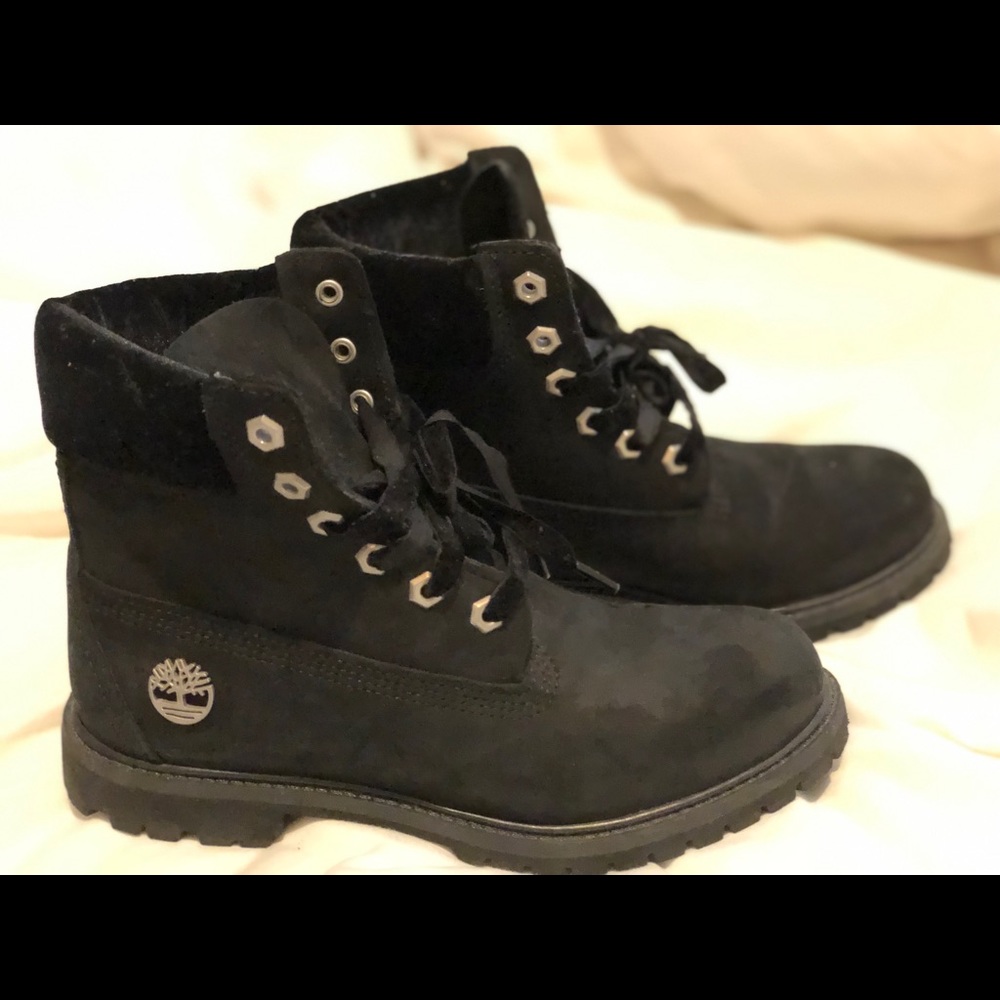 Black Timberland boots with velvet trim